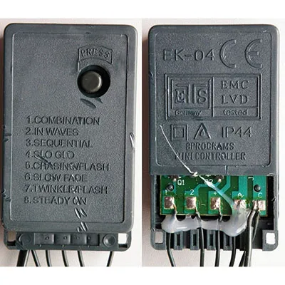 Lanțul de iluminat decorativ cu unitate de control echipată cu 140 de LED-uri albe purpurii, fire izolate verde de pin și o priză care permite extinderea cu unități suplimentare.