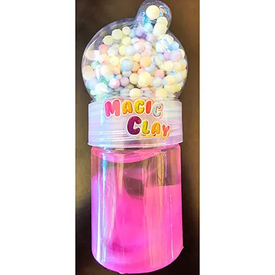 Mâzgă roz cu bile mici colorate în capacul de plastic al jucăriei.