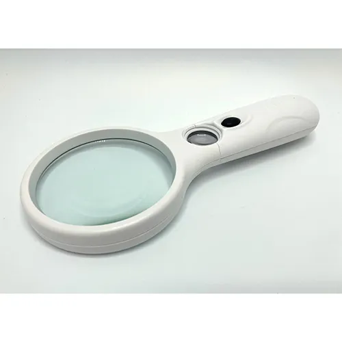 Lupă albă din plastic cu LED. Produs vândut online, în special prin stuffstore.se.