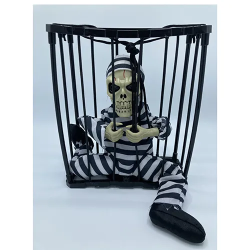 Baterie operată de Halloween produs de decorare cu un schelet într-o cușcă. Produsul are funcții de sunet, lumină și mișcare.