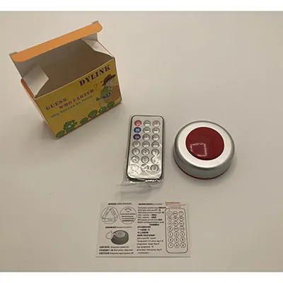 Invenție în formă de puc, aproximativ 5x2,5 cm, din plastic ABS argintiu/maroon. Telecomandă operată. Produs vândut online, în special prin intermediul www.coolpriser.se.