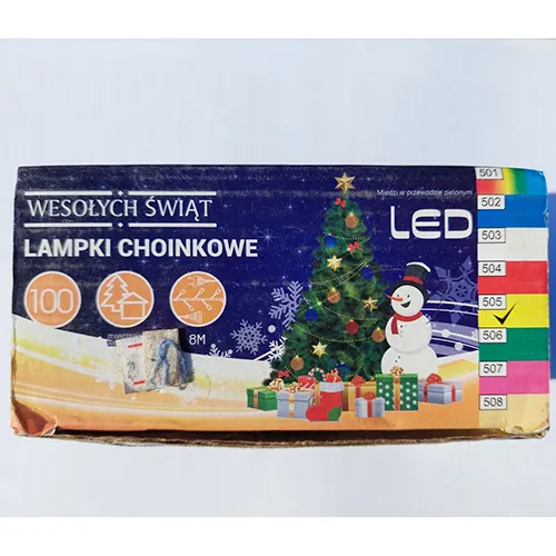 Lanț de iluminat decorativ cu LED-uri de chihlimbar și un fir izolat de culoare verde închis, cu o unitate de control cu opt programe și o opțiune de extensie.