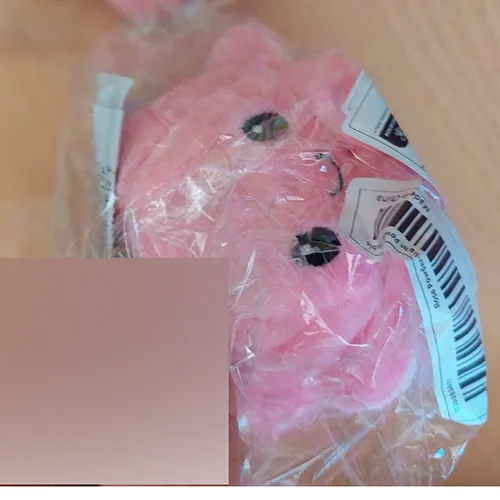 Jucărie moale sub forma unei caracatițe reversibile, cu un inel cu cheie. Dimensiune: 7,62 cm. Produs vândut online, în special prin intermediul Temu.