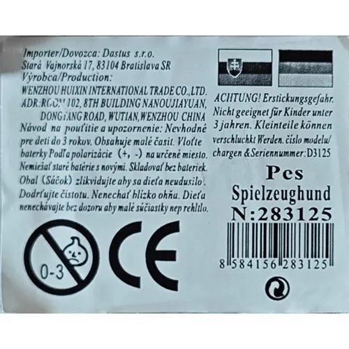 Jucărie de pluș în formă de câine, vândută în diferite culori, cu arcuri roșii atașate la urechile jucăriei și o bandă de cauciuc cu un clopot atașat în jurul gâtului câinelui și o lesă colorată care se termină într-un os de plastic. Jucăria este acționată de baterii cu 2 baterii AA.
