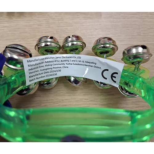 Jucărie muzicală cu clopoței, de culoare verde, cu clopoței. Produs vândut online, în special prin intermediul TEMU.