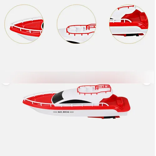 Jucărie de baie în formă de barcă de plastic roșie și albă, cu două motoare cu elice care necesită o baterie fiecare. Produs vândut online, în special prin intermediul eBay (identificator unic: 127095230458).