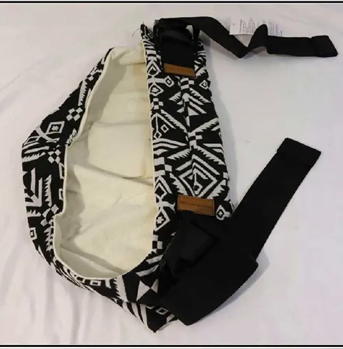 Purtător de copil în stil cangur pentru nou-născuți. Produs vândut online, în special prin intermediul AliExpress.