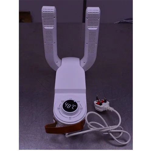 O mașină de uscare electrică albă pentru încălțăminte.